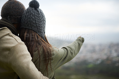 Buy stock photo Back, hiking and pointing with couple in nature together for love, dating or sightseeing. Travel, environment or view with man and woman on mountain peak for bonding on adventure, holiday or vacation
