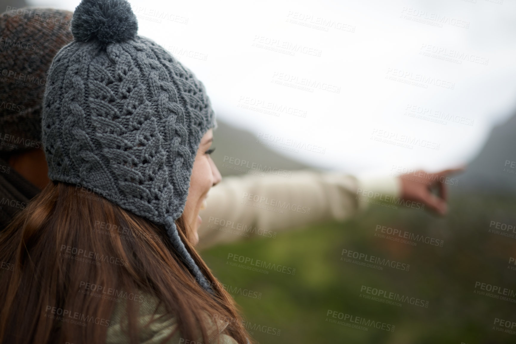 Buy stock photo Face, hiking and pointing with couple in mountains together for love, dating or sightseeing. Travel, smile or view with happy young man and woman bonding in nature for adventure, holiday or vacation