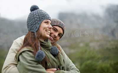 Buy stock photo Couple, hug and happy on hiking vacation in outdoors, love and bonding in relationship for connection. People, embrace and travel for exploring adventure, romance and security in marriage on mountain