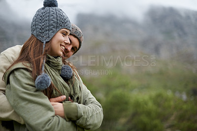 Buy stock photo Couple, hug and smile on hiking vacation in outdoors, love and bonding in relationship for connection. People, embrace and travel for exploring adventure, romance and security in marriage on mountain