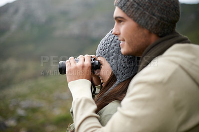 Buy stock photo Binoculars, nature and couple on mountains for journey, adventure and hiking or explore on carbon footprint travel. Love with man and woman in outdoor gear for birdwatching, winter tourism and search