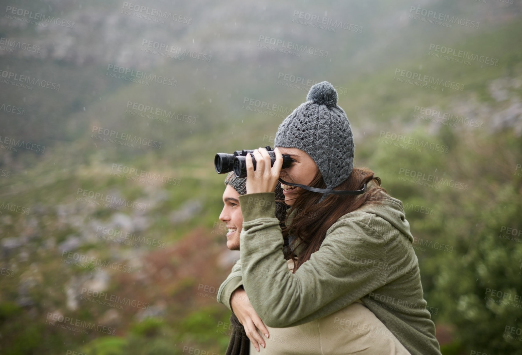 Buy stock photo Hiking, binocular and happy couple on piggyback ride, nature exploration and mountain climbing journey. Camping tour, love and people look at eco friendly destination, trekking view or bird watching