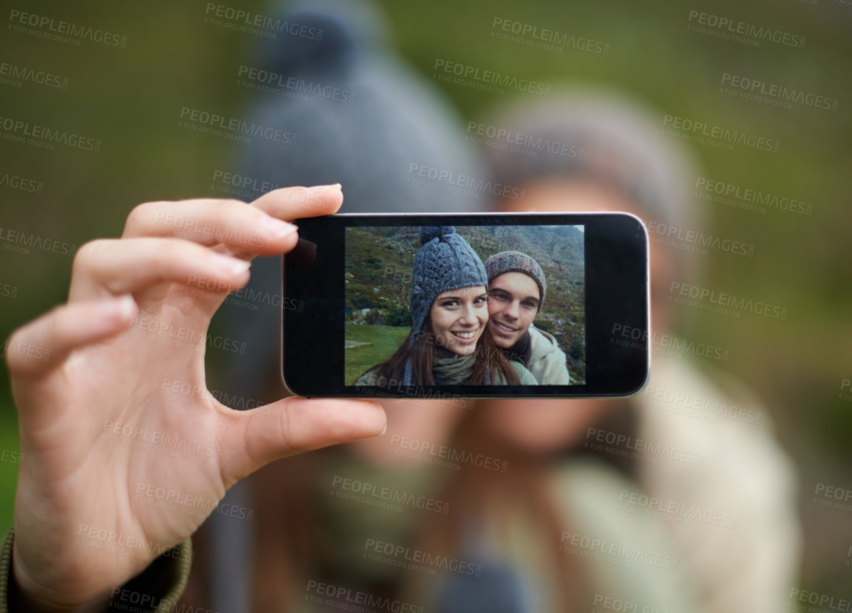 Buy stock photo Couple, hiking and smartphone for selfie in nature, camera and capture moment in outdoors. People, happy and picture for memory and exploring wilderness, trekking and photograph for social media