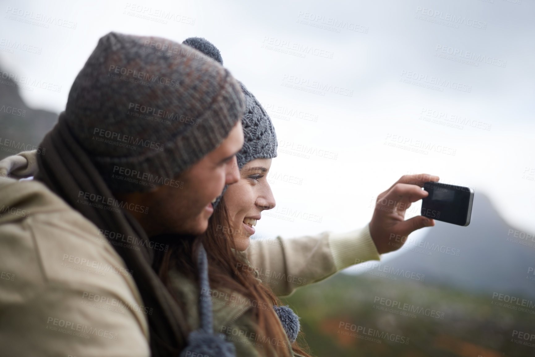 Buy stock photo Happy couple, hiking selfie and mountains for travel, journey and adventure with photography and memory of love. People with hug and smile in profile picture for trekking in winter and nature tourism