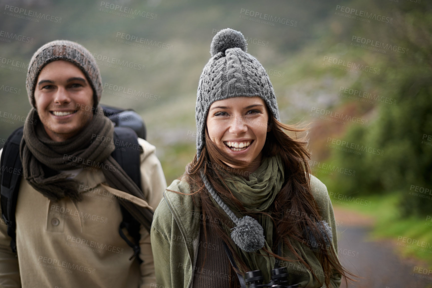 Buy stock photo A happy young couple spending time together outdoors