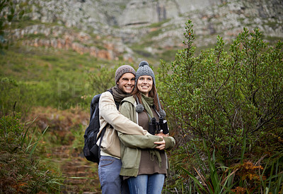 Buy stock photo Forest, hiking and happy couple with hug, mountain and view with backpack, nature and bonding together. Outdoor, adventure and trekking in path, field and exercise for fitness and traveling 
