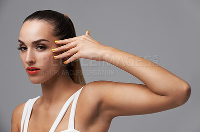 Buy stock photo Beauty, manicure and portrait of studio woman with facial cosmetics, skincare shine or nail paint treatment. Color, clean hands and cosmetology model with makeup glow on grey background
