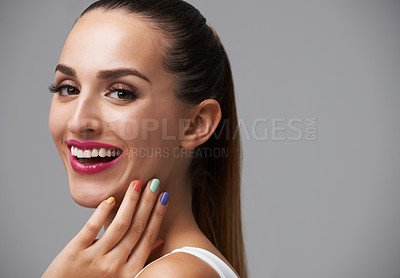 Buy stock photo Happy woman, portrait and manicure with pink lipstick for beauty, rainbow nail polish and cosmetics on grey background. Cosmetology, lips and color nails with makeup, confidence and glamour in studio