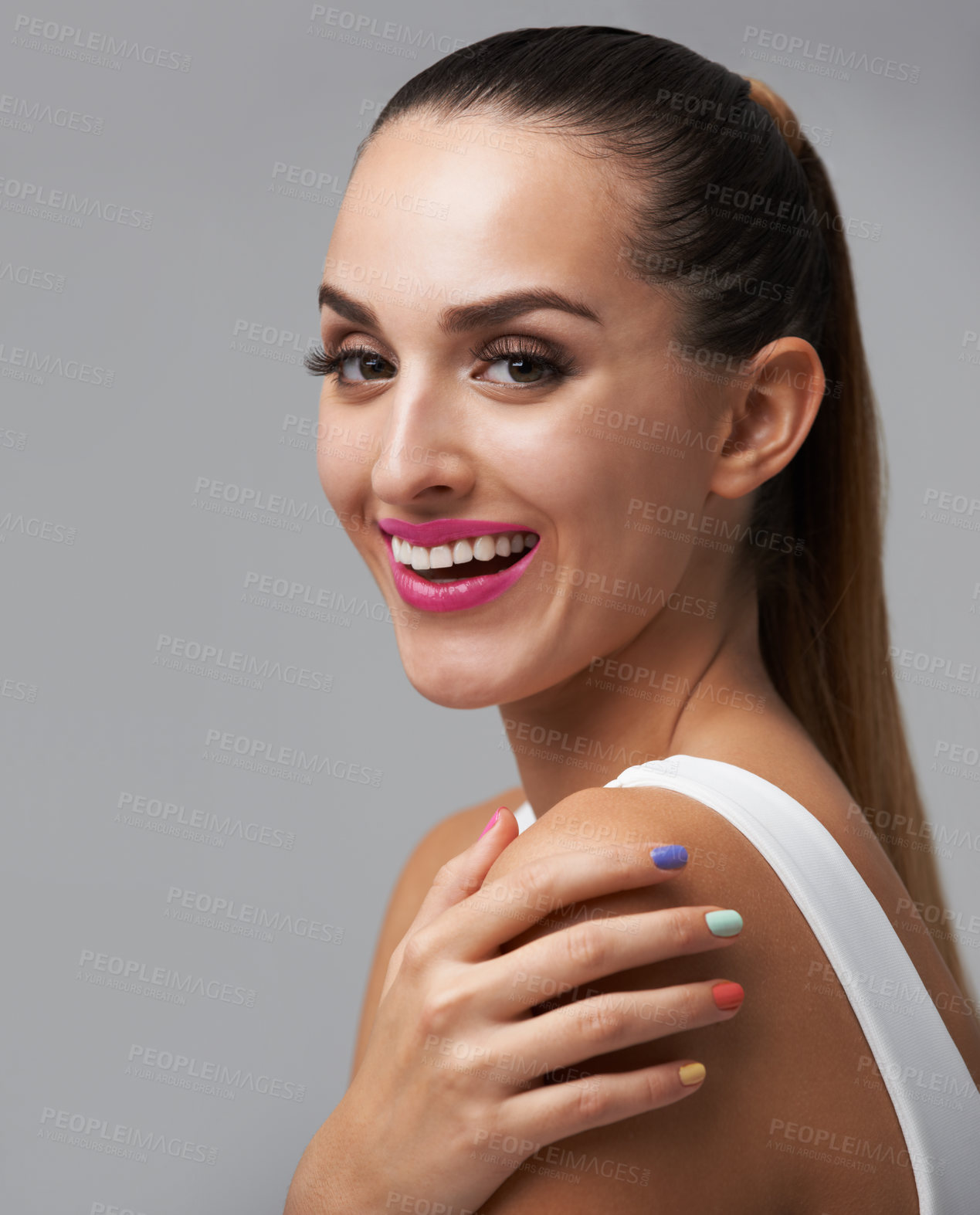 Buy stock photo Happy woman, manicure for beauty and makeup, face of model for cosmetics and nail polish isolated on grey background. Smile in portrait, rainbow color nails and glamour, confident and skin in studio