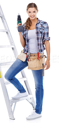 Buy stock photo Full-length shot of an attractive young handy woman standing by a ladder and holding a drill in readiness