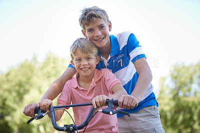 Buy stock photo Nature, happy and portrait of kids on bicycle riding in outdoor field, park or forest for exercise. Smile, cycling and confident young boy children on bike for cardio, hobby or training in a garden.