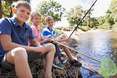 Buy stock photo Children, friends and portrait with fishing rod at river for summer holiday at countryside for vacation, learning or travel. Kids, boys and happy for catch adventure at lake for bonding, sun or relax
