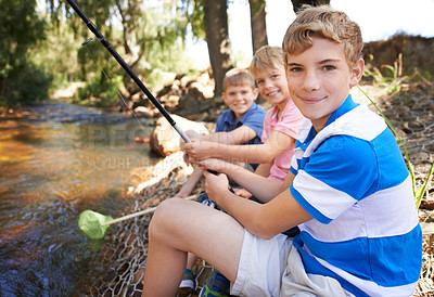Buy stock photo Children, portrait and fishing rod at river in nature for holiday fun at countryside for vacation, learning or travel. Kids, boys and net for catch adventure at lake for teamwork, teaching or relax