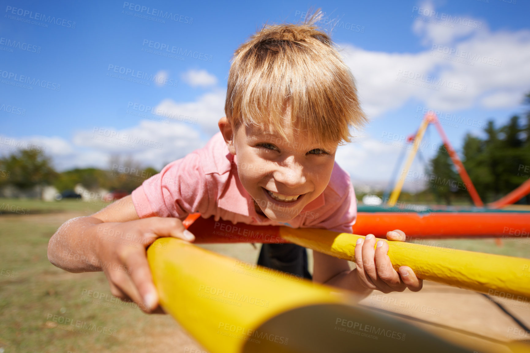 Buy stock photo Portrait, boy and playground with smile, fun and happiness with weekend break and summer. Face, child and kid outdoor, joyful and cheerful with vacation and peaceful with roundabout, fun and excited