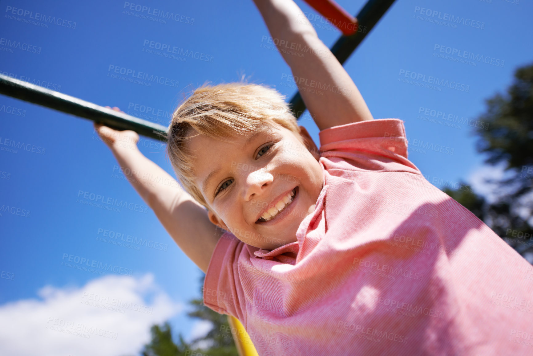 Buy stock photo A little boy playing in the park