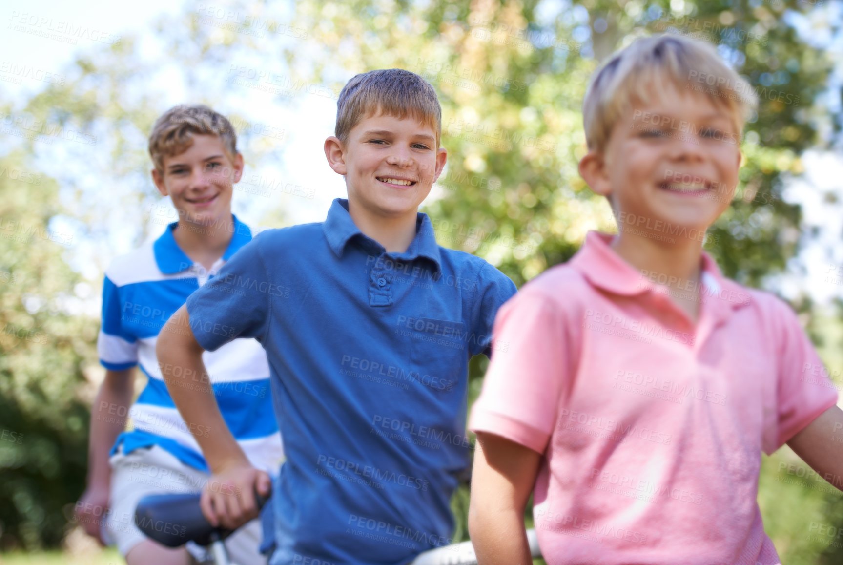 Buy stock photo Nature, happy and kids with bicycle in park learning to ride for exercise in an outdoor forest. Smile, bonding and portrait of young boy children to cycle on bike for hobby in field, woods or garden.