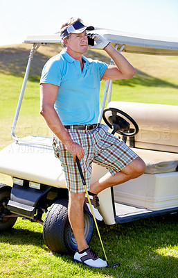 Buy stock photo Man, phone call and golf cart on course for communication at sports training for professional player, talent or skill. Mature person, digital device and club on grass for weekend chat, hobby or pro