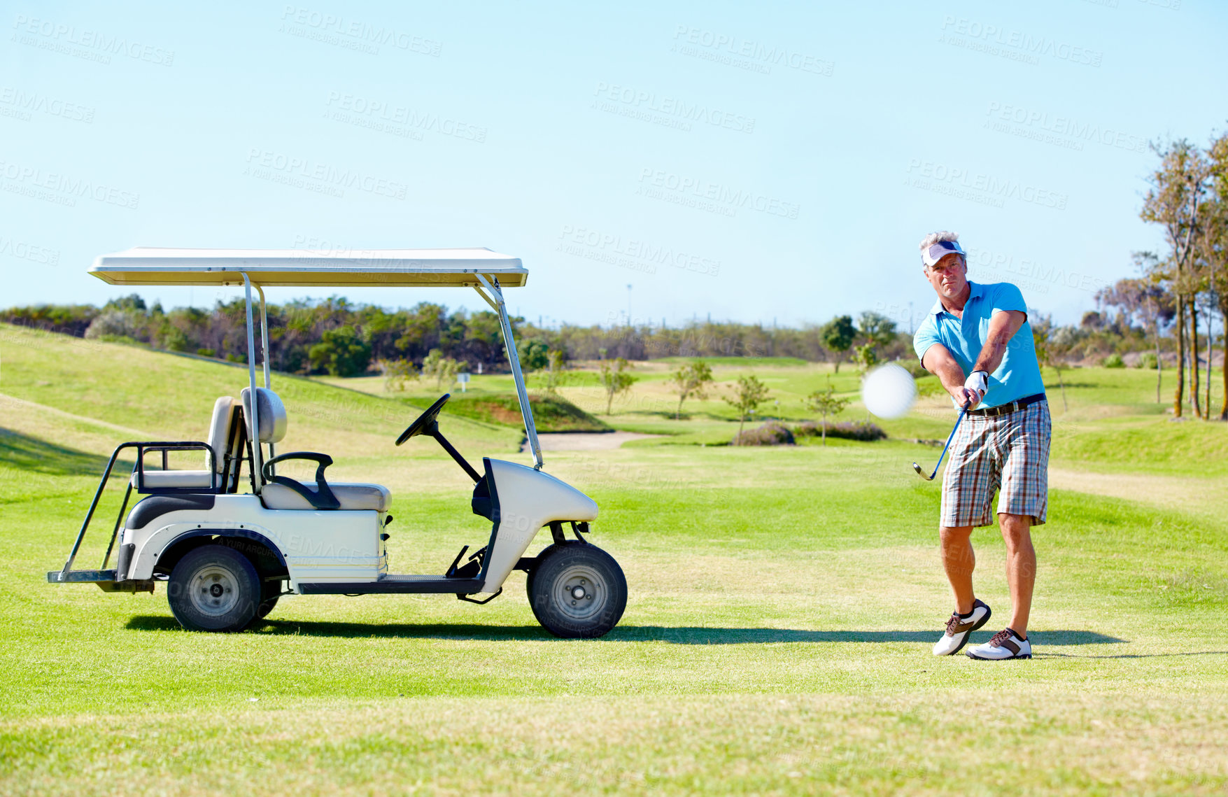 Buy stock photo Sports, relax and swing with man on golf course  with cart for hobby, training and competition. Game, action and fitness with male golfer and stroke on grass field for golfing, summer and recreation 