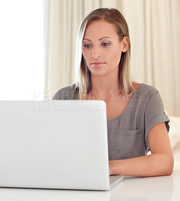 Buy stock photo Woman, laptop and remote work from home with typing, click and thinking for freelance copywriting job. Girl, computer and entrepreneur with analysis, schedule or brainstorming for ideas in apartment