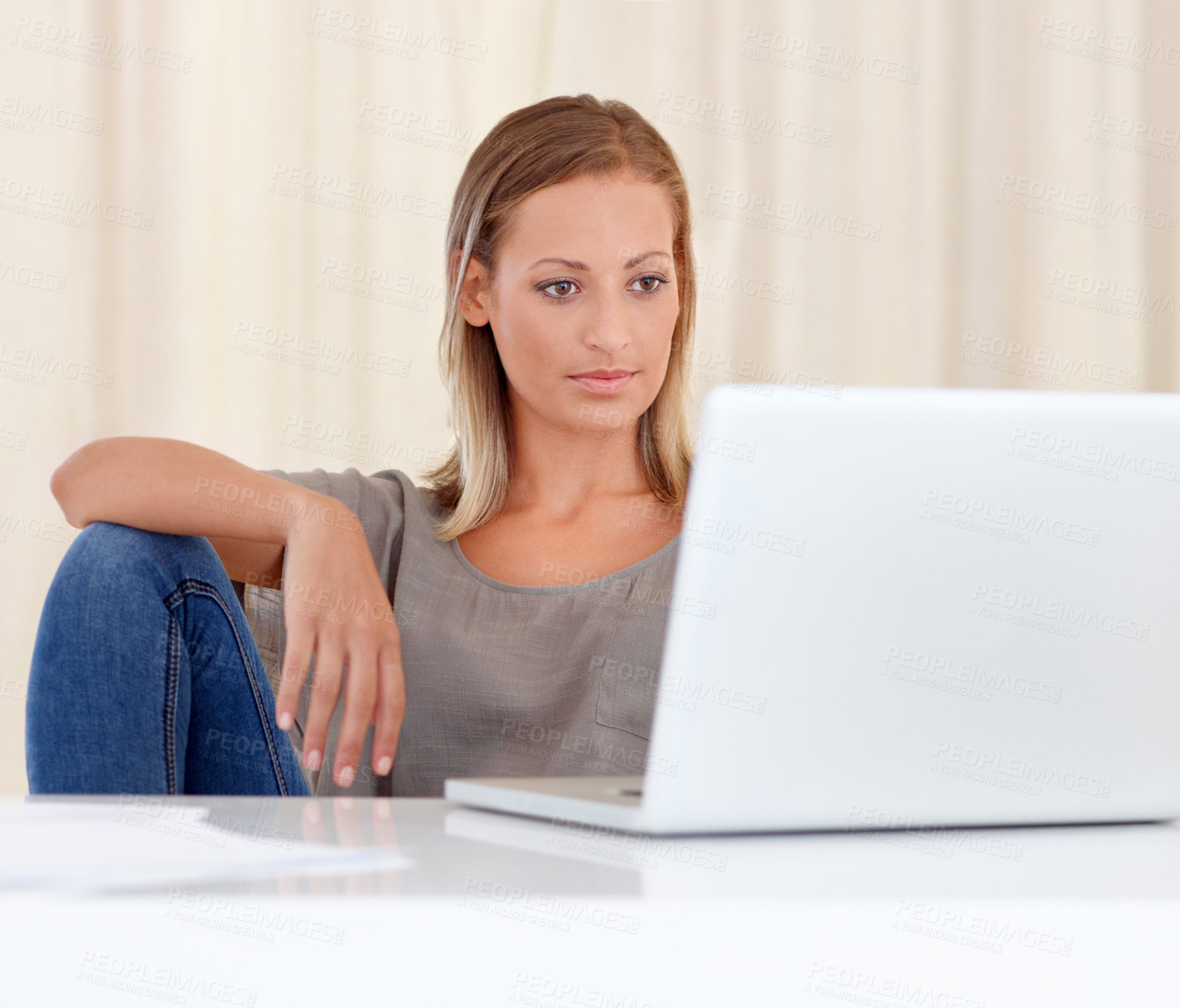 Buy stock photo Woman, laptop and relax in remote work for research, communication or networking at home. Young female person or freelancer working on computer, reading information or browsing internet at house