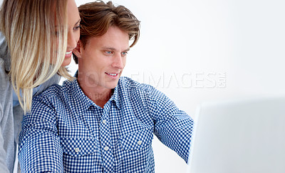 Buy stock photo Couple, laptop and email with online information and social network scroll in a studio. Marriage, computer and tech with web, support and love on the internet with white background and watching video