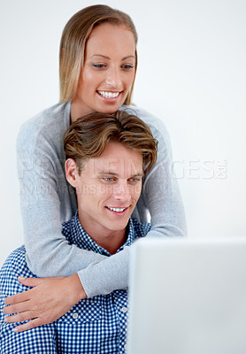 Buy stock photo Laptop, hug and couple on internet, online website and social networking at home. Happy, dating and email with man and woman on computer for relaxing, streaming subscription and remote work together