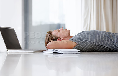 Buy stock photo Laptop, thinking and man student on floor with books for planning, project ideas and future brainstorming. Education, knowledge and male person with textbook and computer for online learning at home