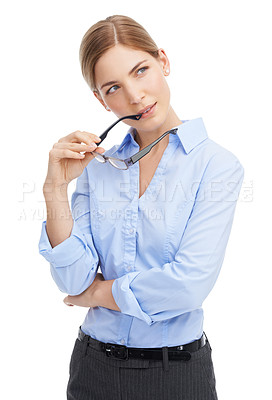 Buy stock photo Thinking, glasses and a business woman in studio on a white background with a future focus mindset. Vision, idea and spectacles with a female employee holding an eyewear frame while contemplating