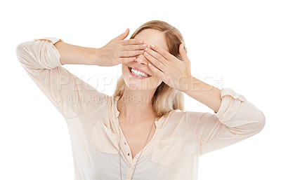 Buy stock photo A beautiful young woman smiling with her hands over her eyes