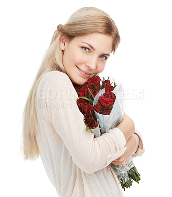 Buy stock photo A young woman standing isolated on white holding a bunch of red roses