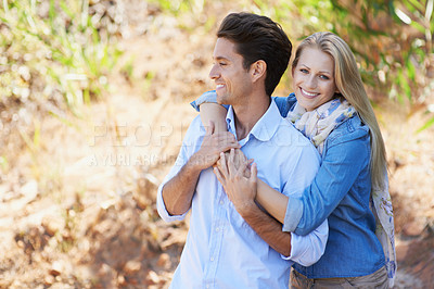 Buy stock photo Couple, portrait and happy in nature with hug in relationship for holiday, vacation or travel. Romance, man and woman with smile outdoor in forest with embrace for bonding, love or relax in woods