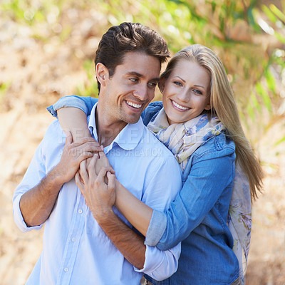 Buy stock photo Couple, portrait and happy or hug with travel in forest, nature or outdoor for holiday, vacation or trip. Romance, man and woman with embrace or smile for relationship, date or honeymoon with love 