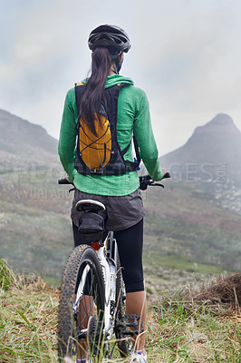 Buy stock photo Woman, mountain bike and fitness in nature trail with vision, ready or idea on adventure with back. Girl, person and start with challenge, race or journey with bicycle on hill workout in Cape Town