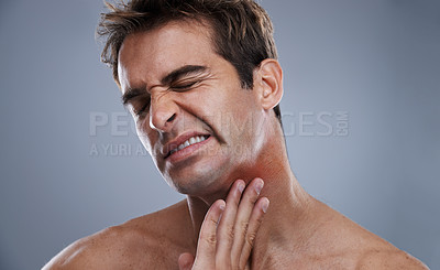 Buy stock photo Man, neck and red rash pain from razor burn for hair removal for hygiene maintenance, mistake or grey background. Male person, hand and unhappy in studio or care fail in inflammation, itchy or mockup