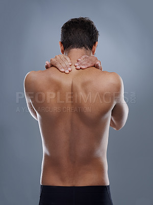 Buy stock photo Man, neck pain and spine problem in studio, medical crisis and muscle tension or injury of training. Model, joint ache and back with inflammation of sport accident and arthritis by grey background