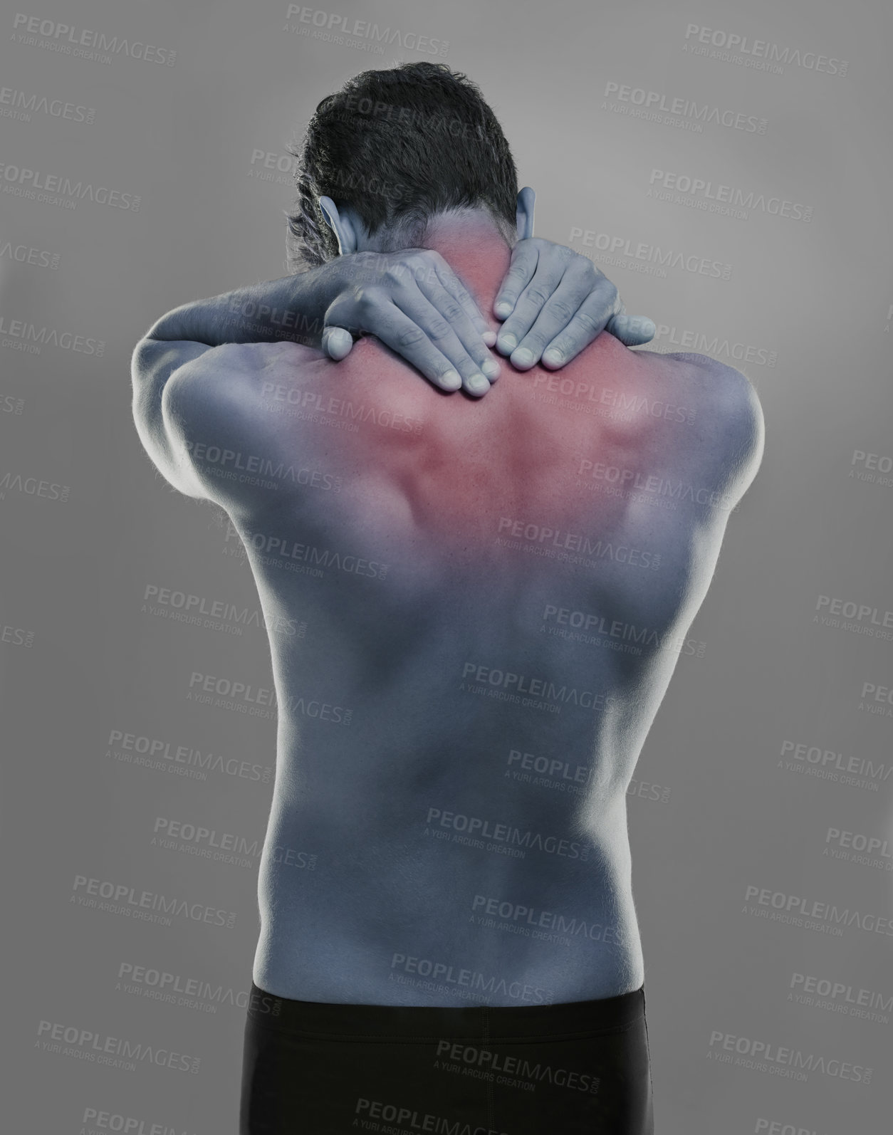 Buy stock photo Back, man and red highlight for neck pain, burnout and muscle tension on a grey studio background. Person, sore and model with inflammation and body ache with bruise and broken with strain and injury