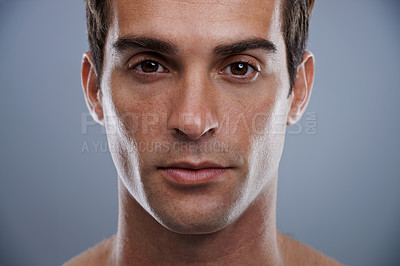 Buy stock photo Portrait, skincare and man with dermatology, wellness and confident guy on grey studio background. Face, person and model with beauty and grooming with routine and cosmetics with glow and aesthetic