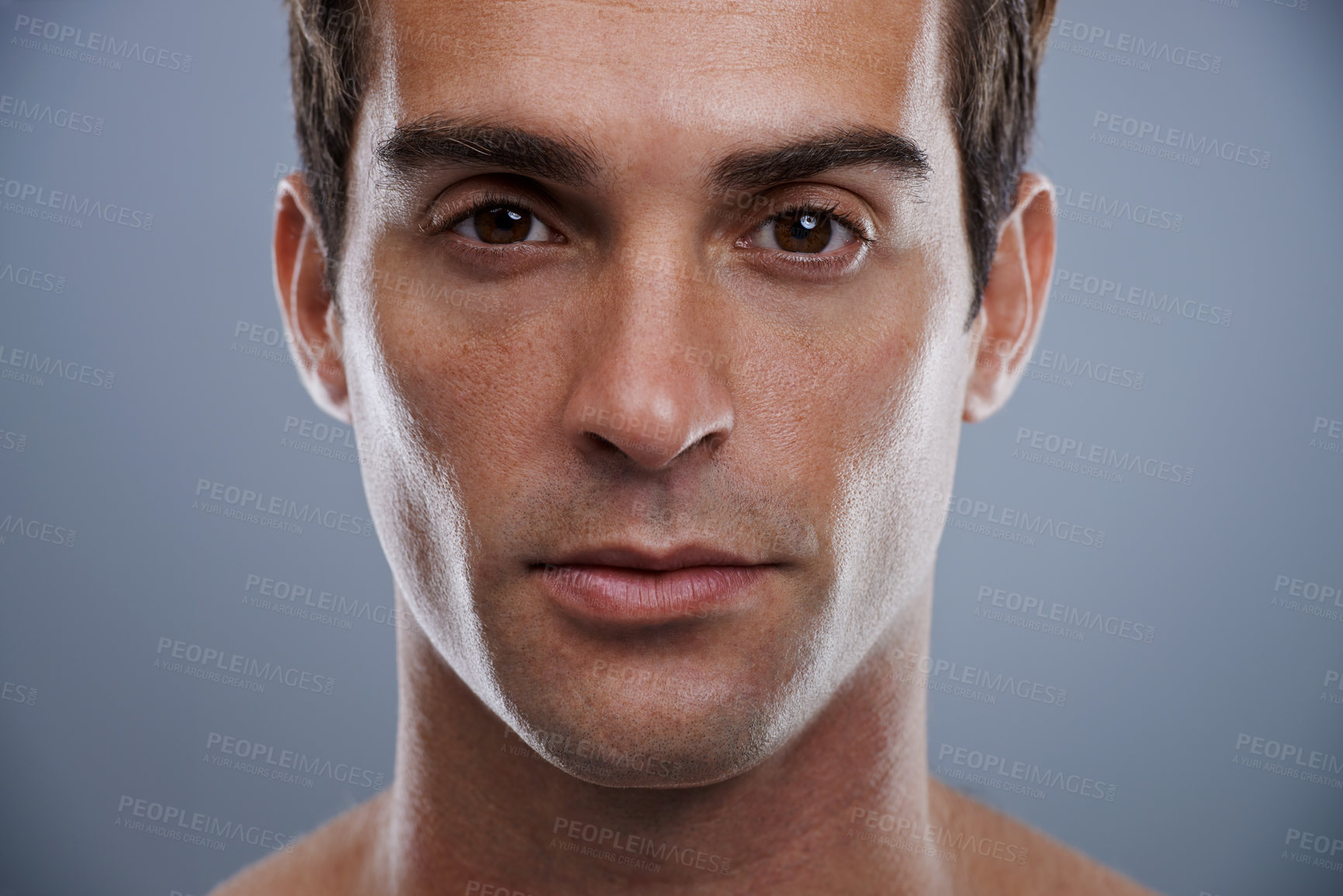 Buy stock photo Portrait, skincare and man with dermatology, wellness and confident guy on grey studio background. Face, person and model with beauty and grooming with routine and cosmetics with glow and aesthetic