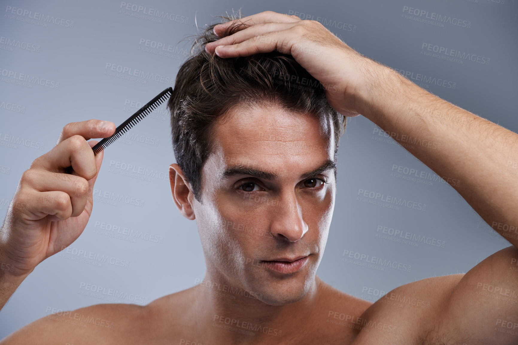 Buy stock photo Man, portrait and comb hair for grooming style on grey background for hygiene, self care and shirtless. Male person, model and face with brush for routine in morning or health, studio or mockup space