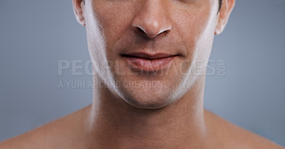 Buy stock photo Cropped image of a handsome man's mouth smiling