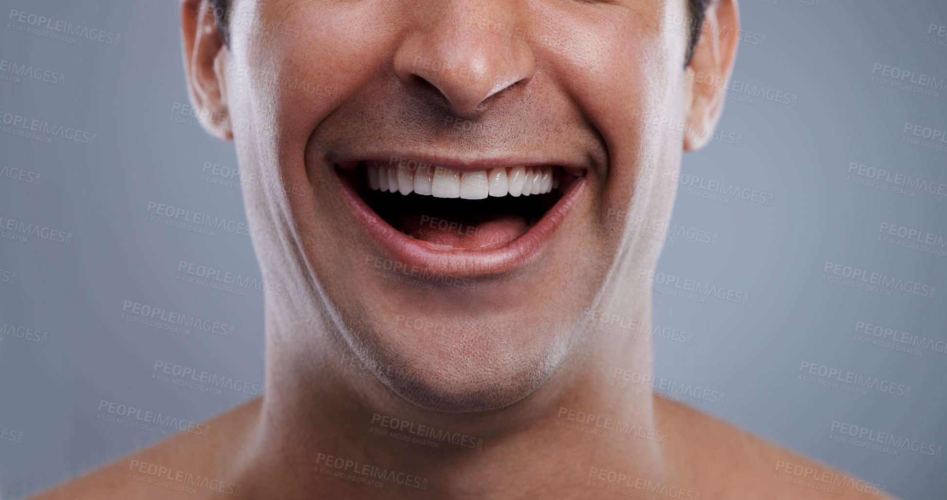 Buy stock photo Man, mouth and laughing with face and lips with hygiene, jawline and satisfaction with treatment closeup. Grooming, confidence and skincare with male model in studio background for cosmetics
