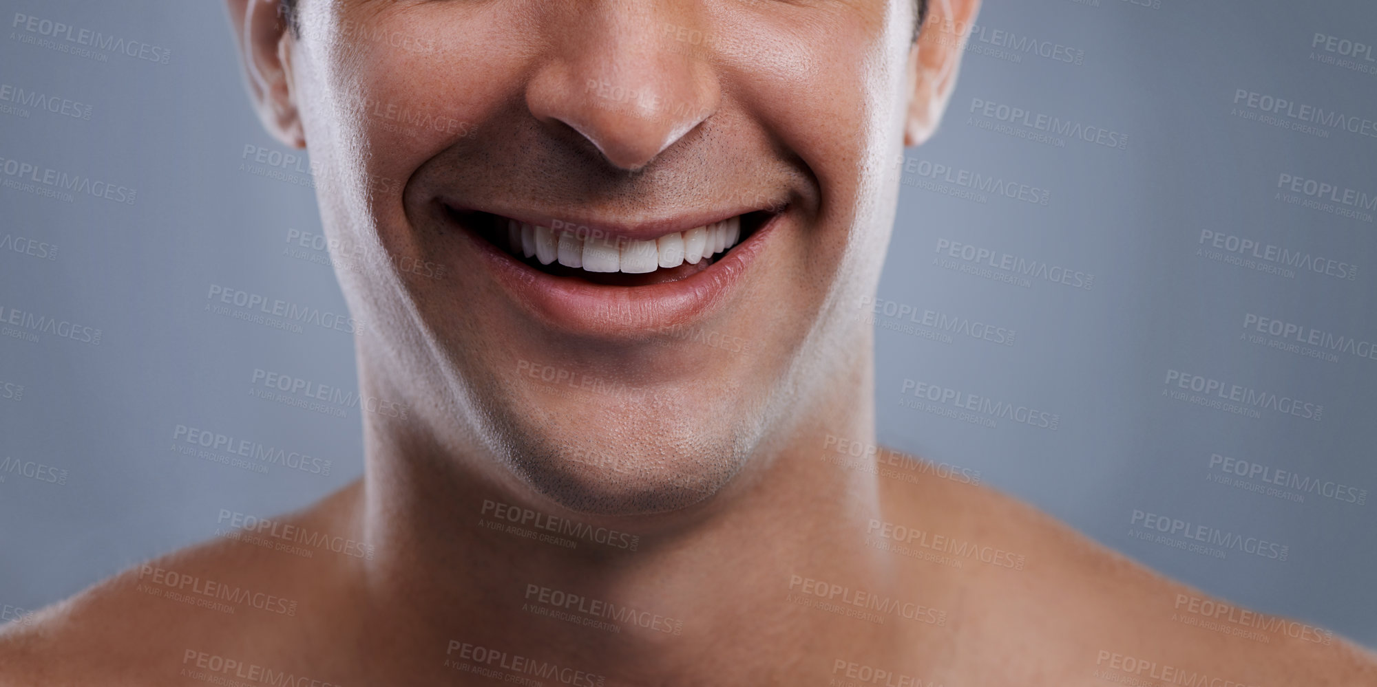 Buy stock photo Man, mouth and smile with skincare and lips with hygiene, jawline and satisfaction with treatment closeup. Grooming, confidence and cropped with male model in studio background for cosmetics