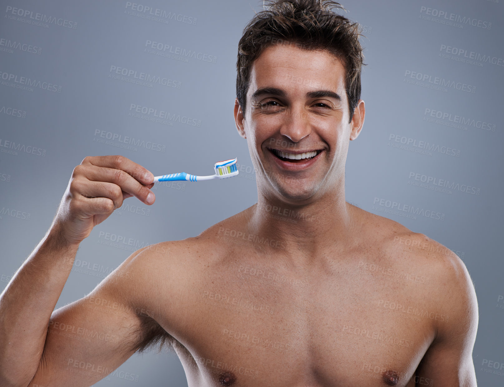 Buy stock photo Portrait, man and smile with toothbrush, dental hygiene and body care on grey studio background. Face, person and model with fresh breath and healthy with toothpaste and morning routine with wellness