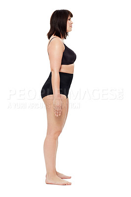 Buy stock photo Side view of a curvy young woman looking away