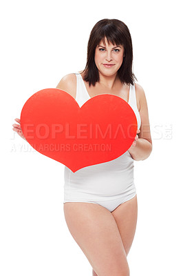 Buy stock photo Portrait, red heart poster and woman in studio isolated on a white background. Love, sign and symbol of plus size model in underwear with healthy body for care, kindness and romance on valentines day