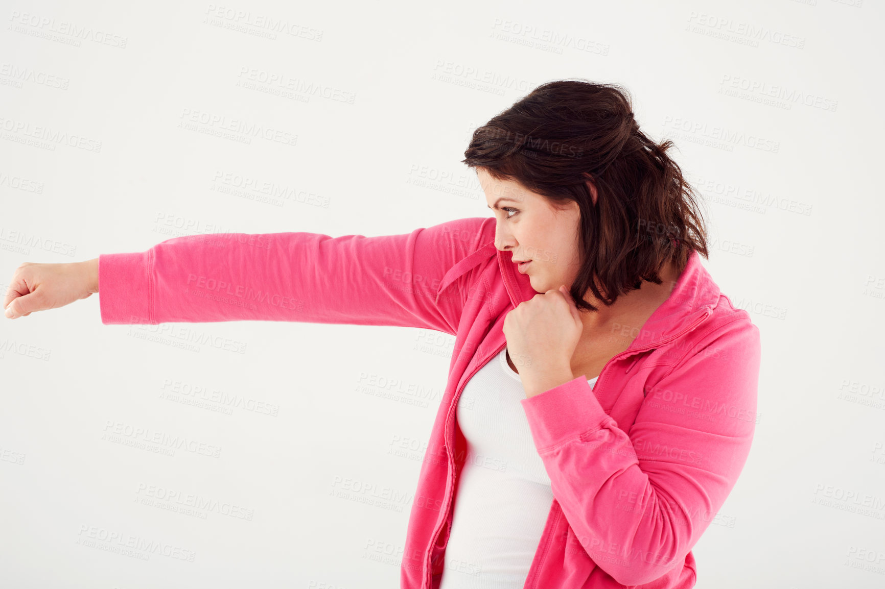 Buy stock photo Woman, profile and boxing with fist in fitness, exercise or workout on a white studio background. Active female person, brunette or fighter in self defense practice, training or punches on mockup