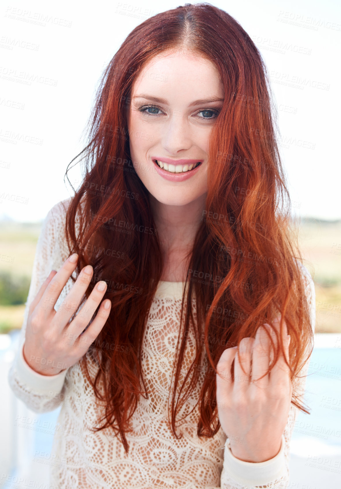 Buy stock photo A beautiful young redheaded woman smiling at the camera