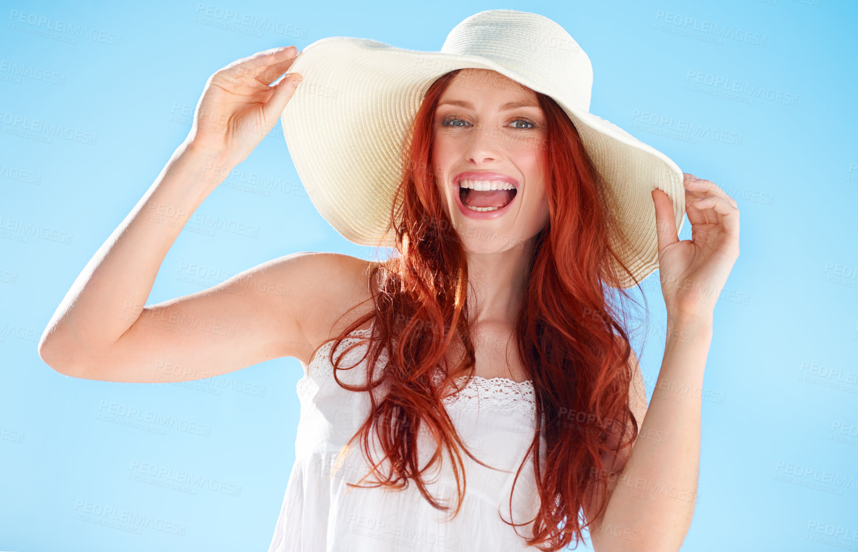 Buy stock photo Happy woman, excited portrait and straw hat outdoor on blue sky, fun style and freedom to relax. Female person, red hair and smile in sunshine with fashion accessory, happiness and summer holiday