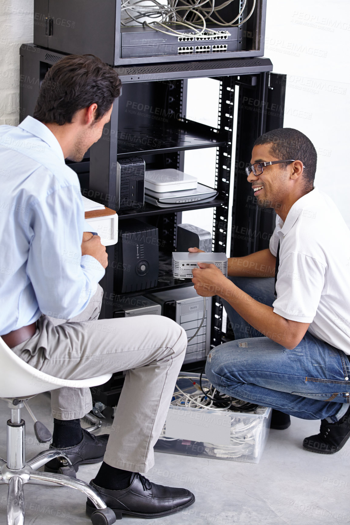 Buy stock photo Server room, it support and maintenance with an engineer talking to a business man about cyber security. Network, database and consulting with a technician chatting about information technology