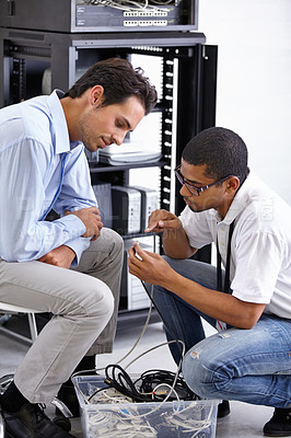 Buy stock photo Server room, network and maintenance with a technician talking to a business man about cyber security. IT support, database and consulting with an engineer chatting about information technology